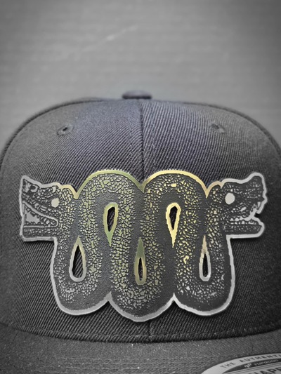 Serpiente bicéfala Snapback