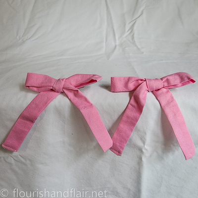 Set of two tied ribbons