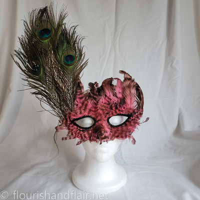 Pink feather half mask