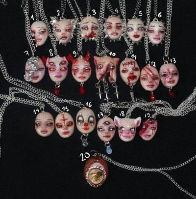 Handmade little doll face necklace