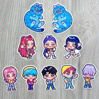 Huntrix rumi mira zoey saja boys jinu romance abby baby mystery blue tiger kpop demon hunters sticker