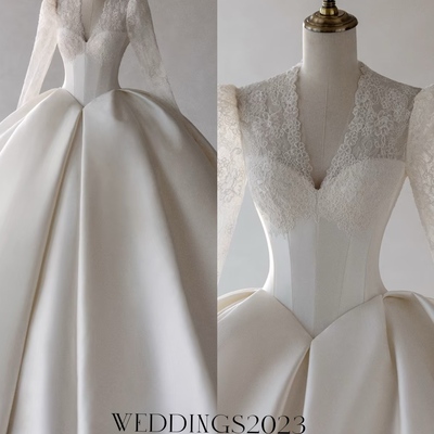 Ivory off-the-shoulder satin wedding dress, a-line gown with lace bodice and long sleeves, trailing bridal shape, minimalist bridal gown