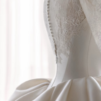 Ivory off-the-shoulder satin wedding dress, A-line gown with lace bodice and long sleeves, trailing bridal shape, minimalist bridal gown - Thumbnail 7