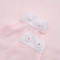 High-neck solid color long-sleeved slim-fit jumpsuit with tassels and a miniskirt - Thumbnail 6