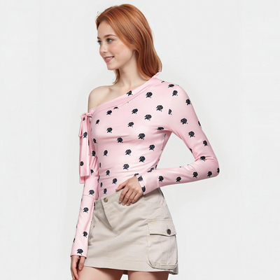 Off-shoulder rose print top with slanted neckline and lace-up