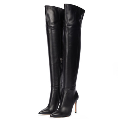 Large black arrow loose fit over-the-knee boots