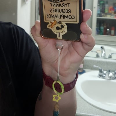 Mr. electric blue phone charm