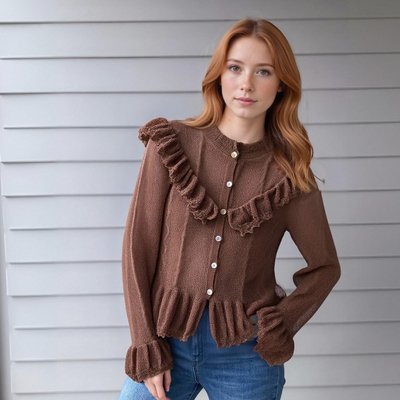 Long-sleeved knitted top with ruffled trim and hollow lace