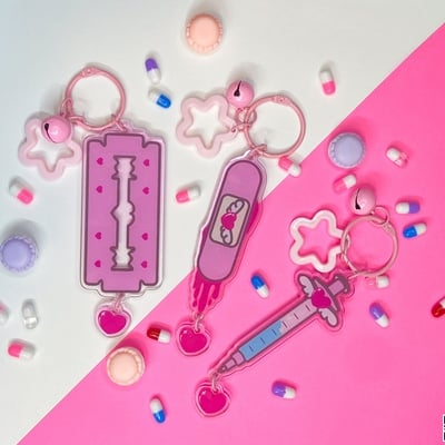 All the pink things acrylic charm