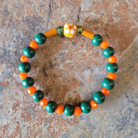 RATTLER PRIDE🐍🧡💚 BRACELET💫 READY-MADE⏳️🎨 By Nubian Collection Artwear 👑 🔹️ SIZE: 6 & 1/2 INCHES 🧿 ONLY ONE AVAILABLE⏳️⏳️ - Thumbnail 2