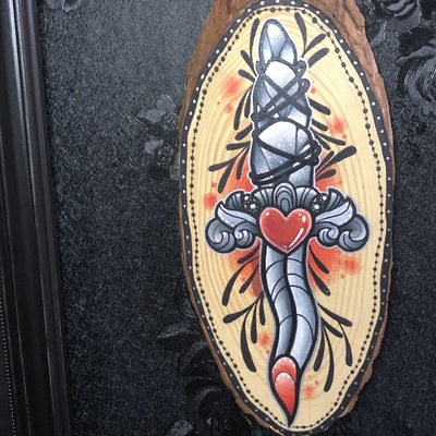 Heart dagger wood slice