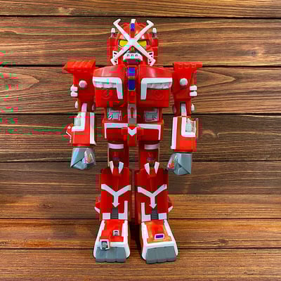 Red robot guy sofubi vinyl figure