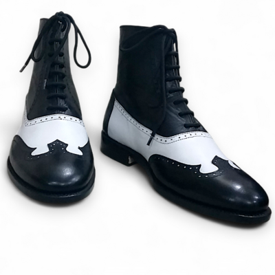 Crafted leather black white leather classic wingtip ankle high lace up dress boot