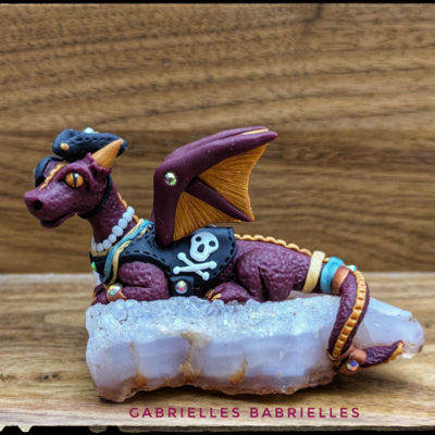 Pirate dragon sculpture on a crystal 