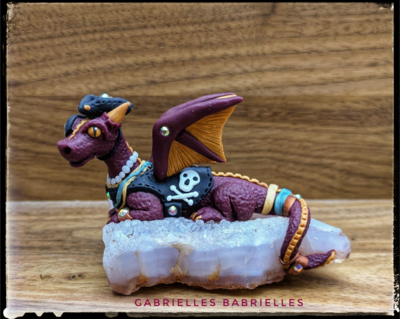 Pirate Dragon sculpture on a crystal 