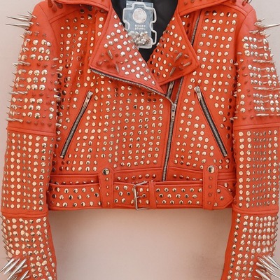 Crafted leather classy women orange red leather studded jacket with silver studs and spikes