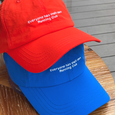 Everyone has their own running club cap