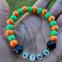 FAMU KING 👑🧡💚 GLOW IN THE DARK ALPHABET BRACELET🐍🐍🧡💚 READY-MADE🎨⏳️ By Nubian Collection Artwear 👑 - Thumbnail 2