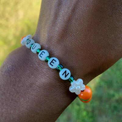 Famu queen 👑🧡💚 glow in the dark alphabet bracelet🐍🐍🧡💚 ready-made🎨⏳️ by nubian collection artwear 👑