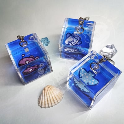 Liquid fish cube keychains