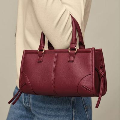 Tassel clutch - final sale