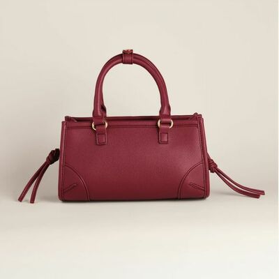 Tassel clutch - final sale