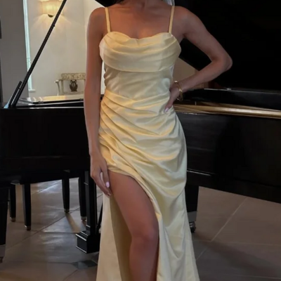 Spaghetti strap yellow prom dress pleated with split