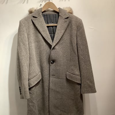 D&G wool 3 button coat with a racoon fur hood.