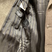 D&G wool 3 button coat with a racoon fur hood. - Thumbnail 1