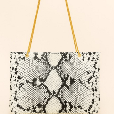Crafted leather classic and luxury snake design of a white, black snake skin 