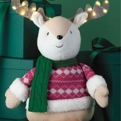 Whimsical forest reindeer sitters