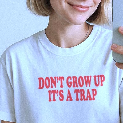 Free shipping-don't grow up it's a trap tee