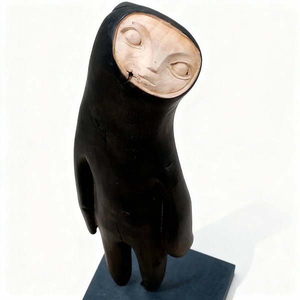 Wooden sculpture by Tach Pollard "Wind Walker" 