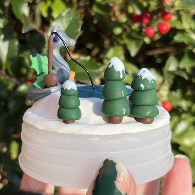 Lake fishing dragon ornament