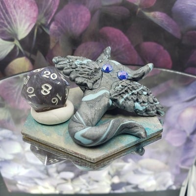Shimmery blue-grey skymanta dice guardian