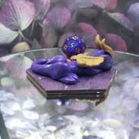 Sleepy Purple and Gold Dragon Dice Guardian - Thumbnail 1