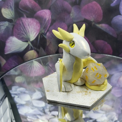 White and gold firebird dice guardian