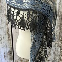 Wool Ilvy Shawl in "Rip Wheeler" yarn, with blue and charcoal gray trim - Thumbnail 1