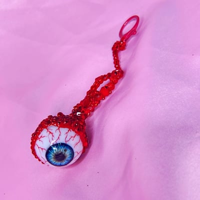 Plucked eyeball bag charm