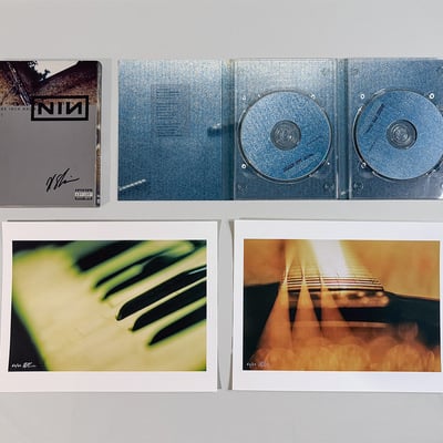 Signed dvd + print pairing: nin "and all that could have been" dvd set with two prints