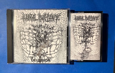 MORAL IMPLANT - Delusion (CD + Cassette)
