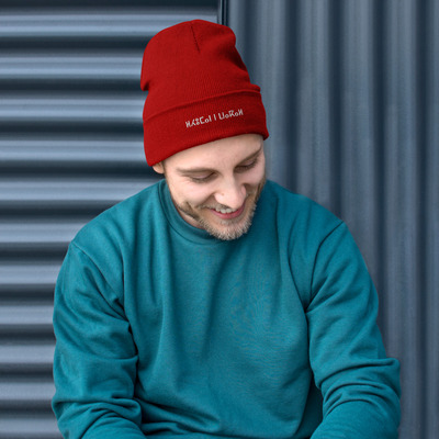 Unique embroidered design, classic cuffed skull cap.