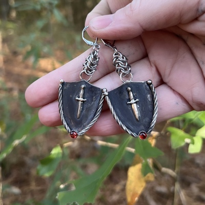 Sword crest earrings 