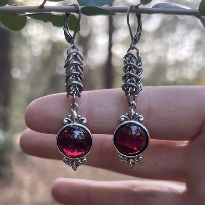 Framed garnet earrings