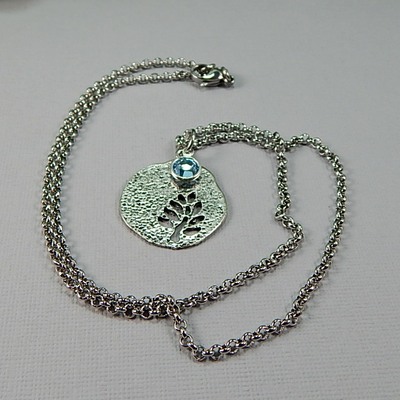 March birthstone leaf pendant necklace - handmade silver leaf cutout with aquamarine crystal charm