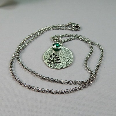 May birthstone leaf pendant necklace - handmade silver leaf cutout with emerald crystal charm