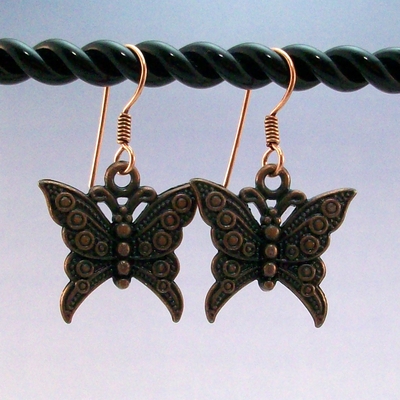 Copper butterfly charm earrings – handmade nature inspired jewelry with pure copper earwires