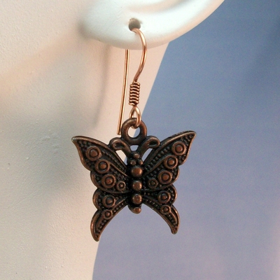 Copper butterfly charm earrings – handmade nature inspired jewelry with pure copper earwires