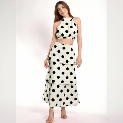 Polka dot print halter neck sleeveless top and tiered skirt set.