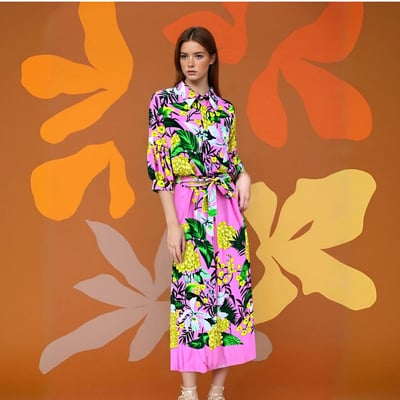 Women's two-piece set with long-sleeved top and skirt.